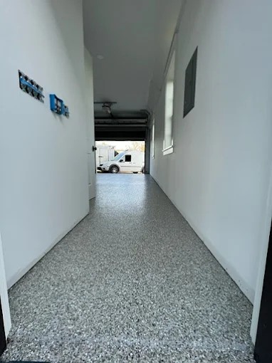 Completed epoxy and concrete coating project by Mr. Epoxy and Paint LLC