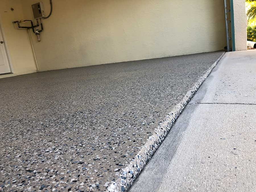 Completed epoxy and concrete coating project by Mr. Epoxy and Paint LLC
